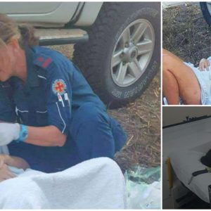 The incredible moment a mother cradles her newborn daughter just minutes after giving birth on the side of a busy highway as they rushed to hospital